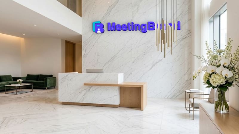 Marble reception — a virtual background room with a company sign on the wall (shown with the MeetingBrand logo)